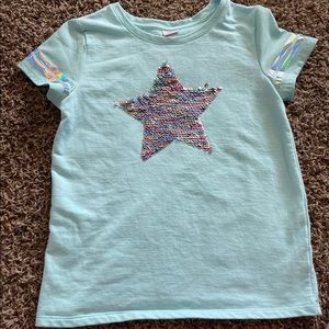 Sequin. Iridescent top.